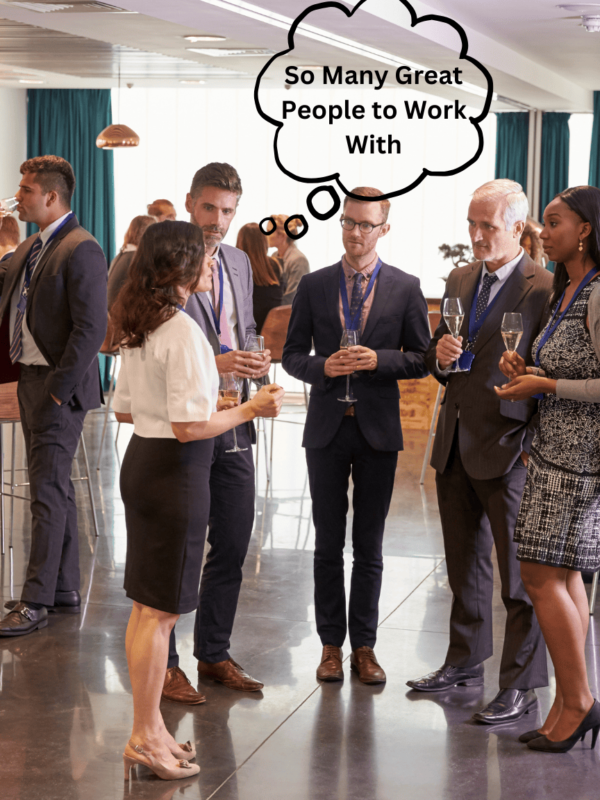 A group of people in suits networking and getting more commercial construction leads