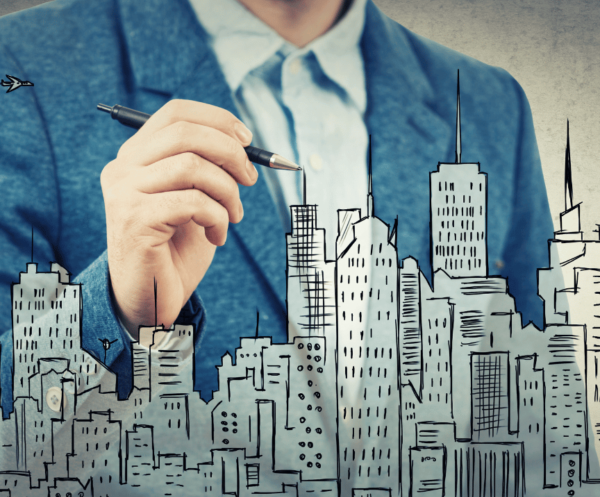 A business man painting a picture of multiple commercial buildings.