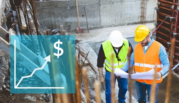 Contractor reviewing profit numbers